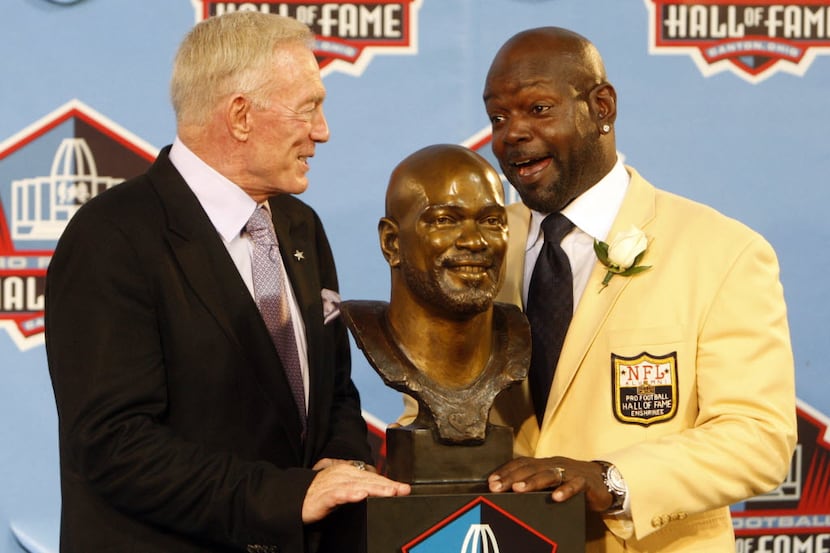 Emmitt Smith with Jerry Jones and Smith's bust at Fawcett Stadium in Canton, Ohio, on August...
