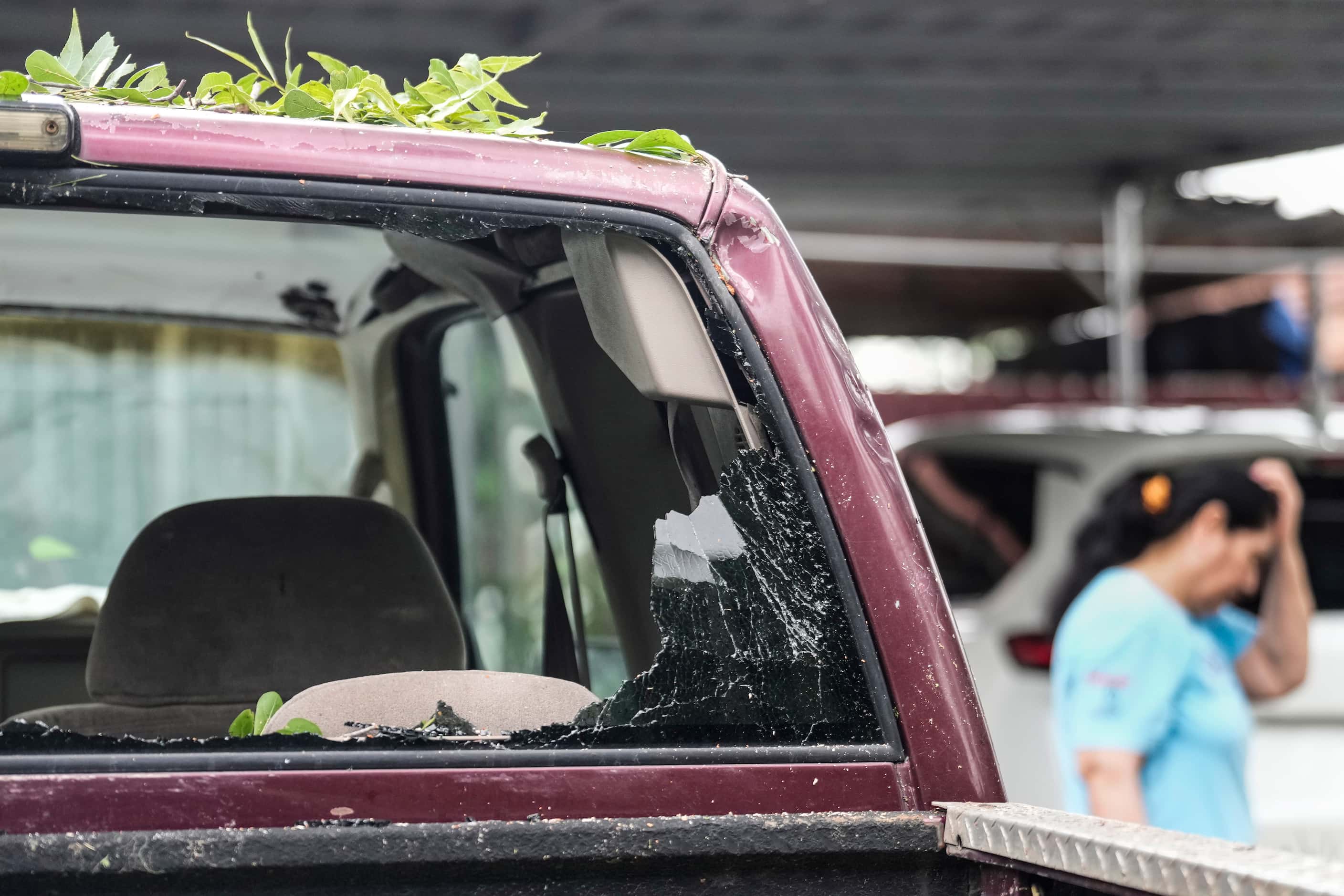 Glass in a truck is blown out in the aftermath of a severe storm on Friday, May 17, 2024 in...