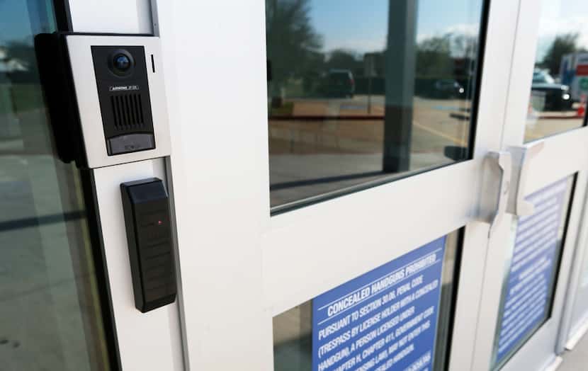 A camera at the main entrance at McKinney North High School in McKinney on Monday. 