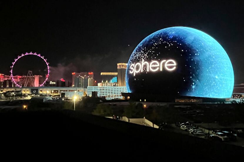 FILE - The Sphere is illuminated, Tuesday, July 4, 2023, in Las Vegas. NHL Commissioner Gary...