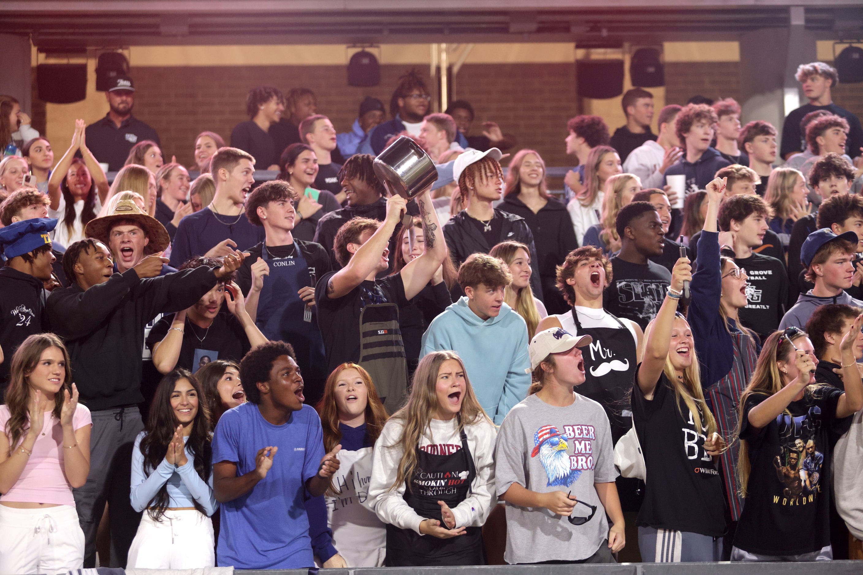 Walnut Grove fans cheer after a touchdown during the Prosper Walnut Grove High School at...