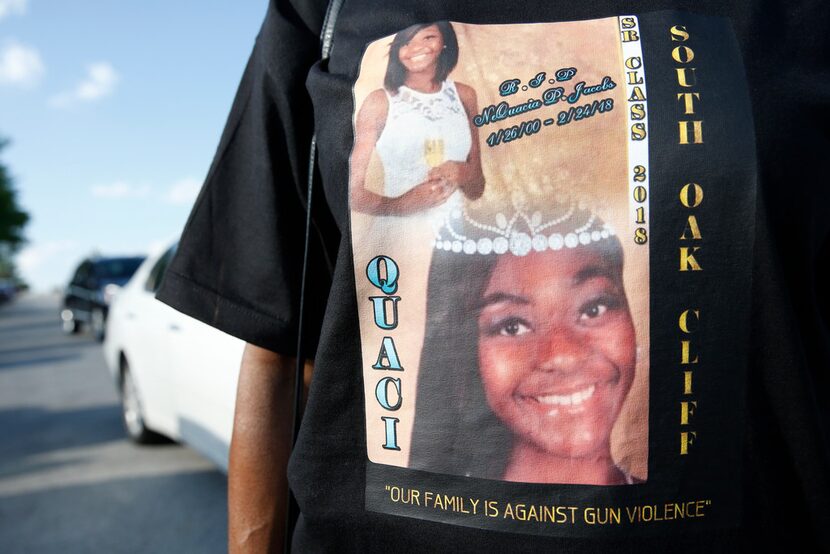 A family member of NeQuacia Jacobs wore a shirt in her memory after South Oak Cliff High...