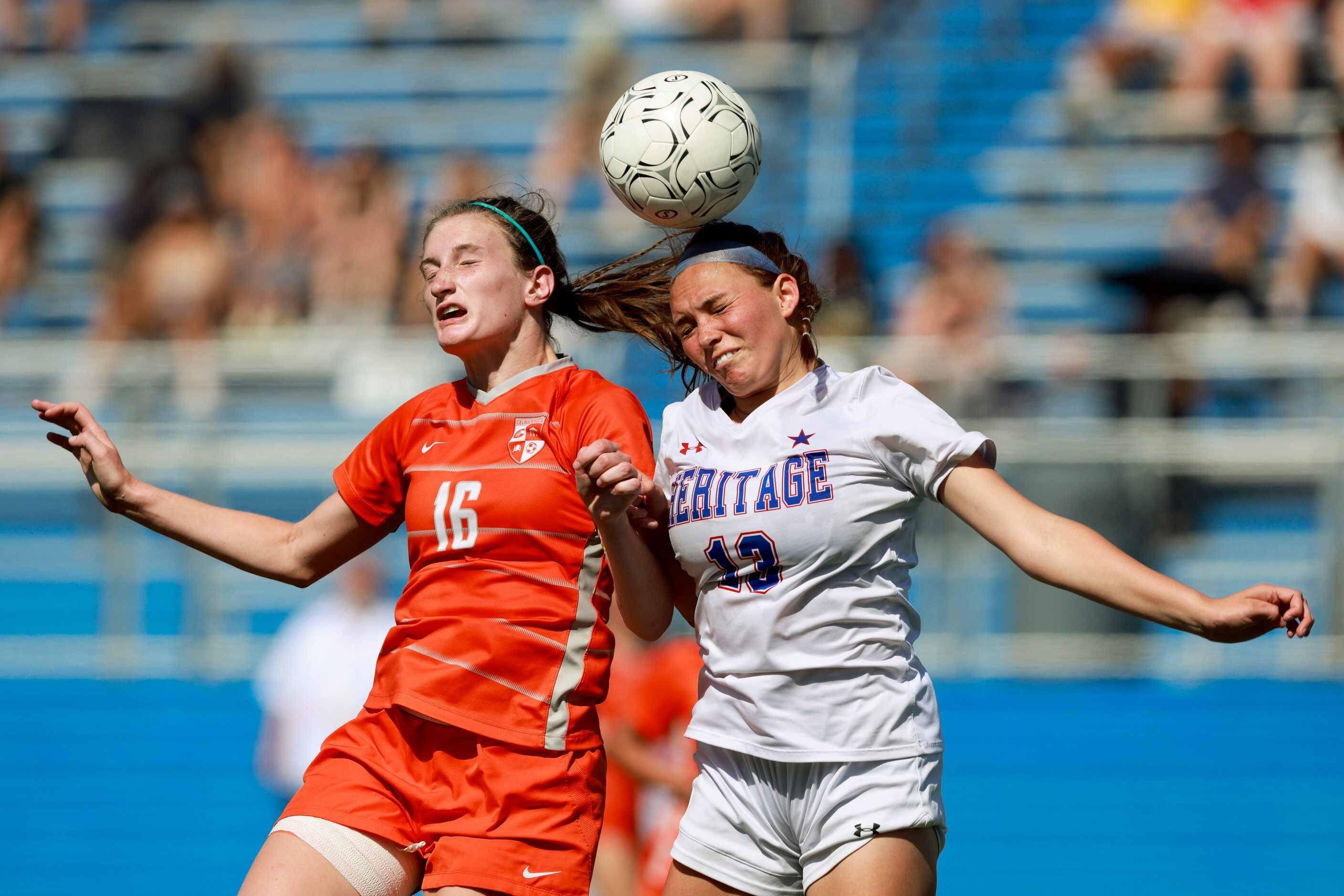 Celina forward Taylor Zdrojewski (16) and Midlothian Heritage defender Jaidyn Sandefer (13)...