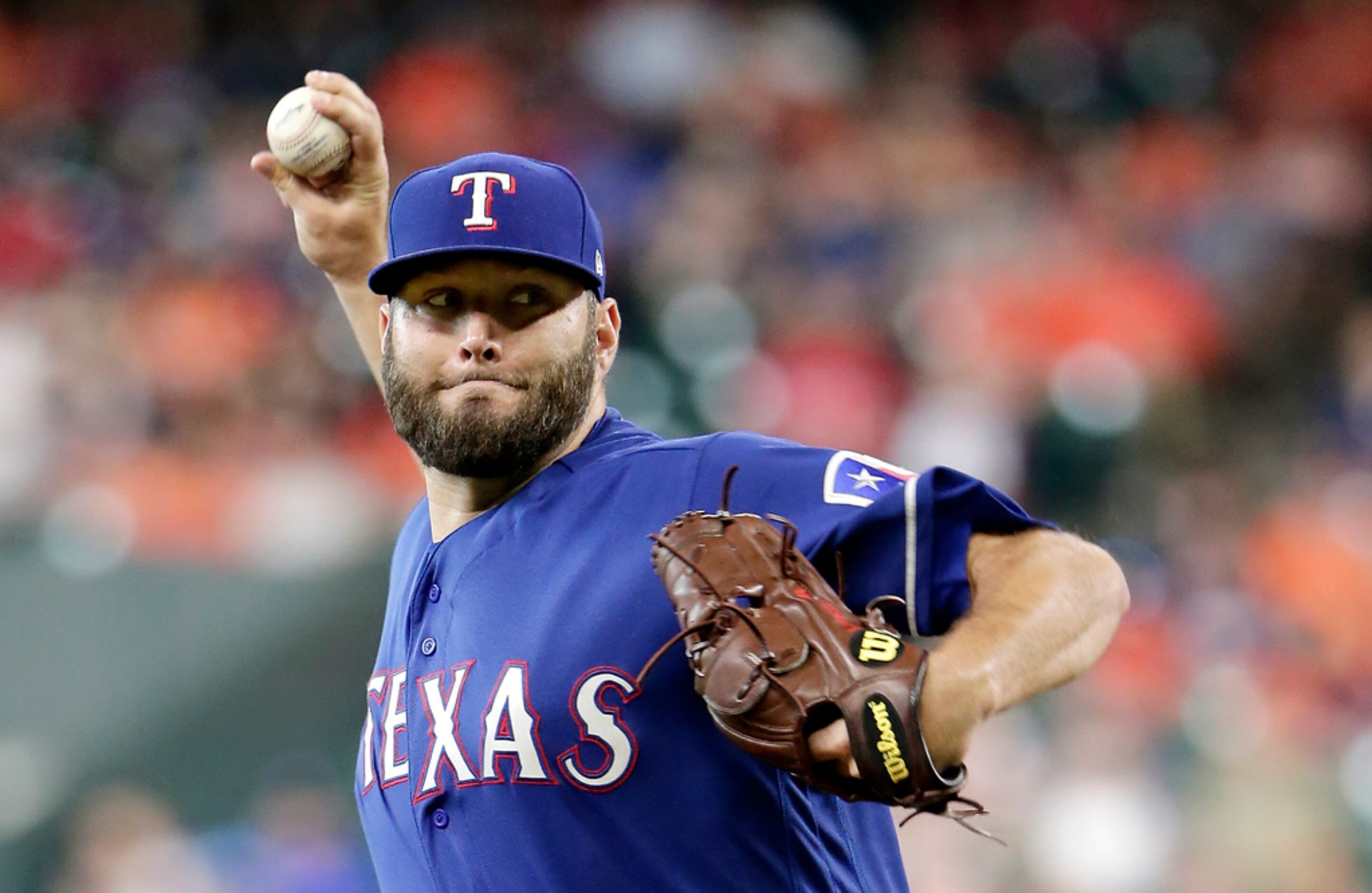 Texas Rangers starting pitcher Lance Lynn throws against the Houston Astros during the first...