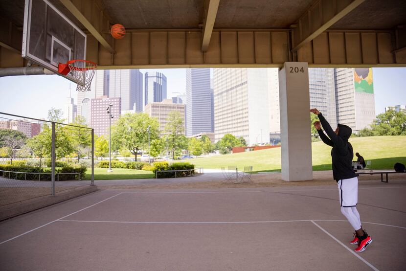 Raymond Pace of Dallas played on the basketball court at Carpenter Park in downtown Dallas...