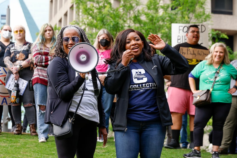 Texas House Rep. Jasmine Crockett (right) speaks alongside Michelle Anderson, policy...