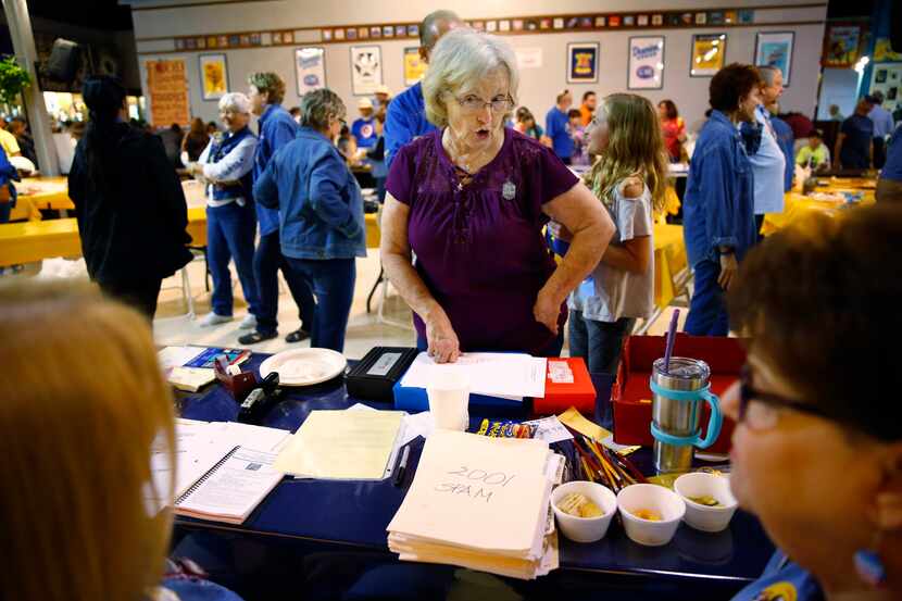 Peggy Garmon brags about her granddaughters to administrators of the contest at the State...