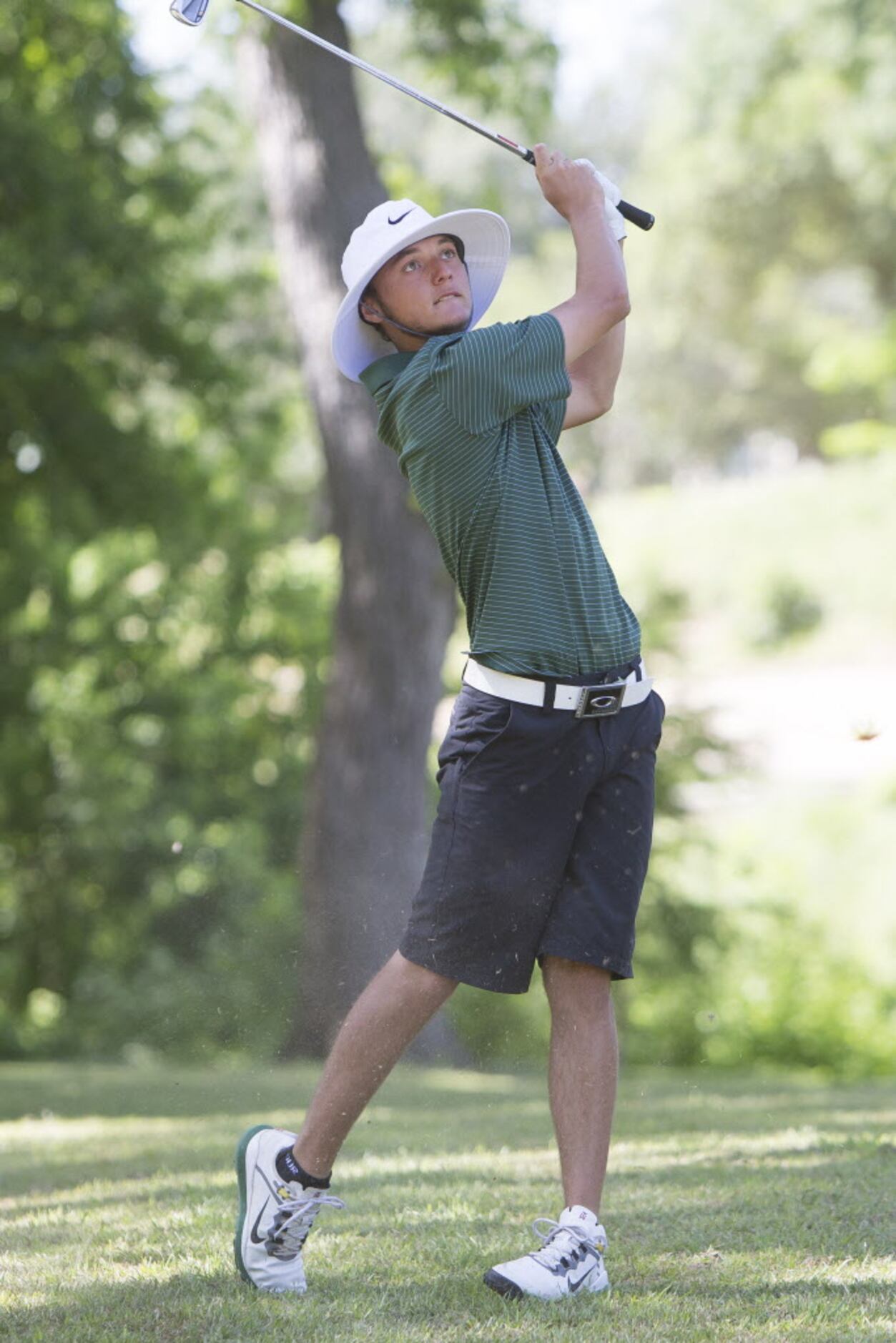 Southlake Carroll freshman Willie Hammond makes a drive on the fourth hole during the UIL 5A...