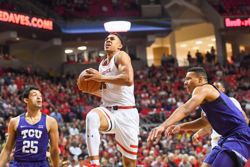 LUBBOCK, TX - MARCH 3: Zhaire Smith #2 of the Texas Tech Red Raiders goes to the basket...
