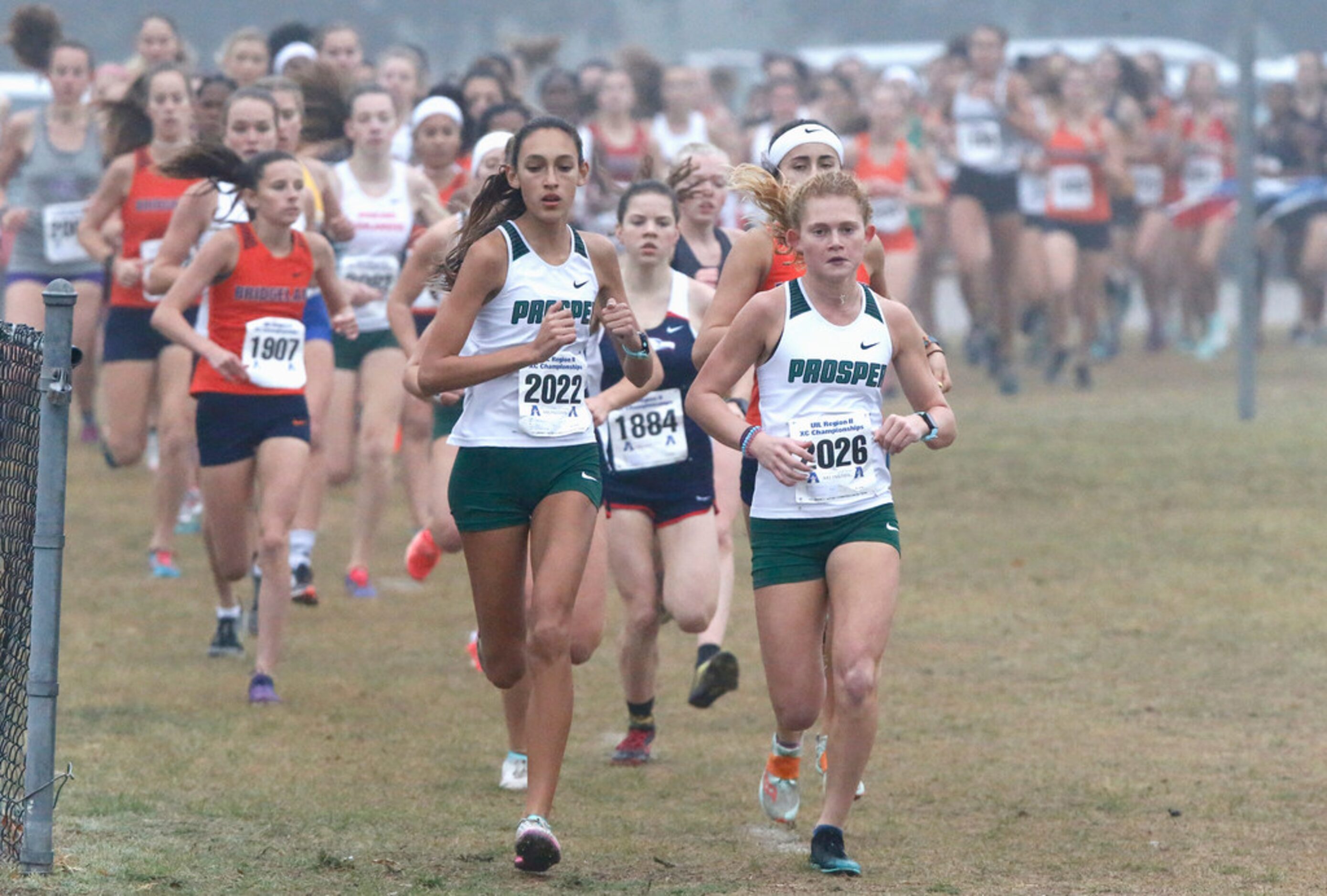 Prosper High School's Sadie Gonzales (2022) and Aubrey O'Connell (2026) led the pack for a...