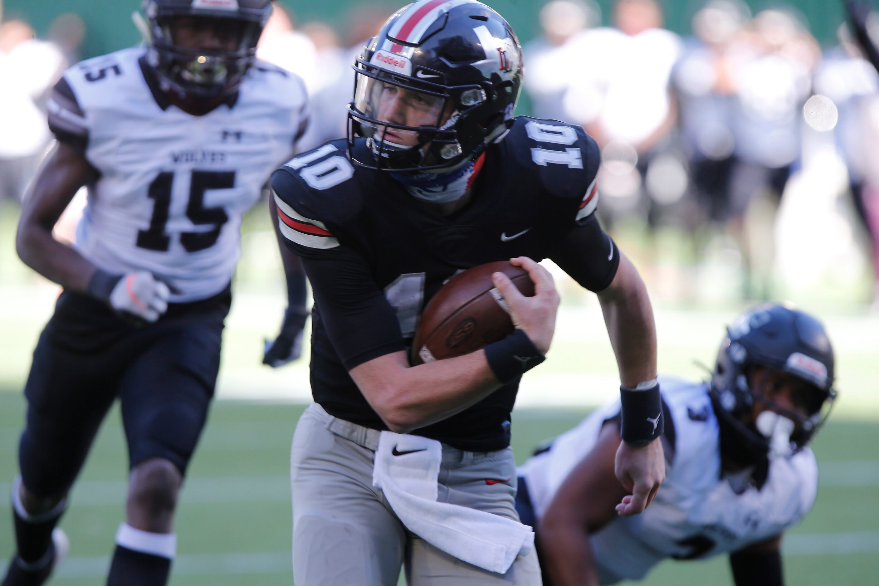 Lovejoy High School quarterback R.W. Rucker (10) runs for a touchdown as Lovejoy High School...