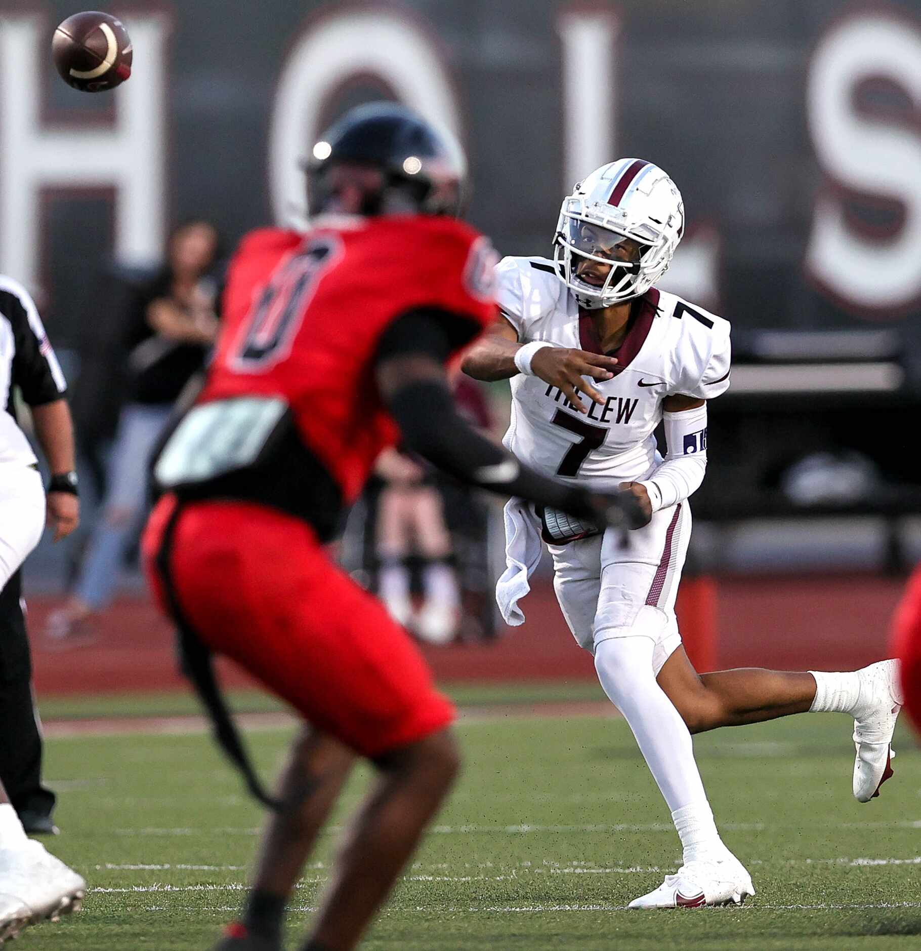 Lewisville quarterback Ethan Terrell (7) throws the ball downfield against Coppell during...