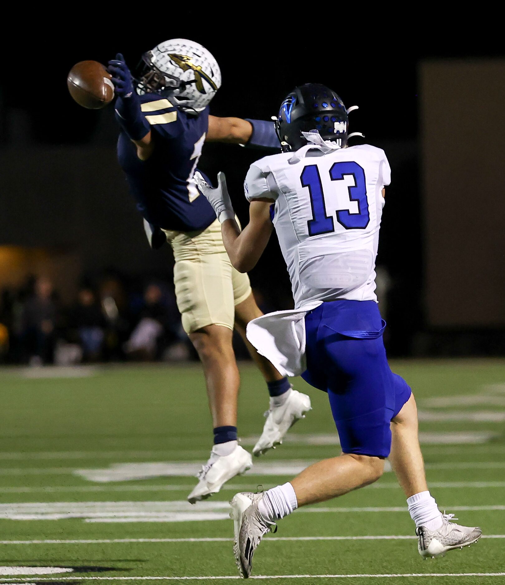 Keller defensive back back Ryan Ventura (7) breaks up a pass intended for Byron Nelson wide...