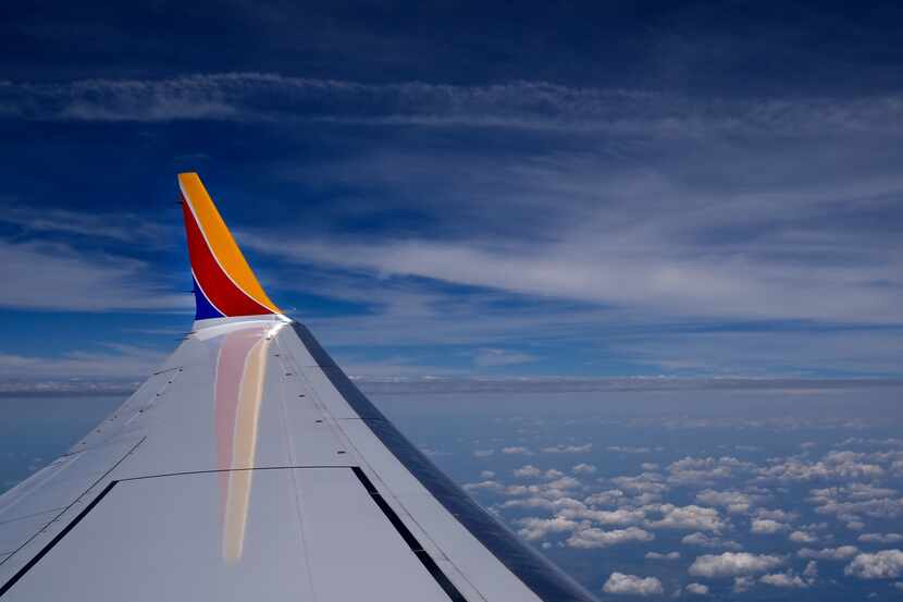 A Southwest Airlines Boeing 737 Max 8 passenger jet flies over the central United States...