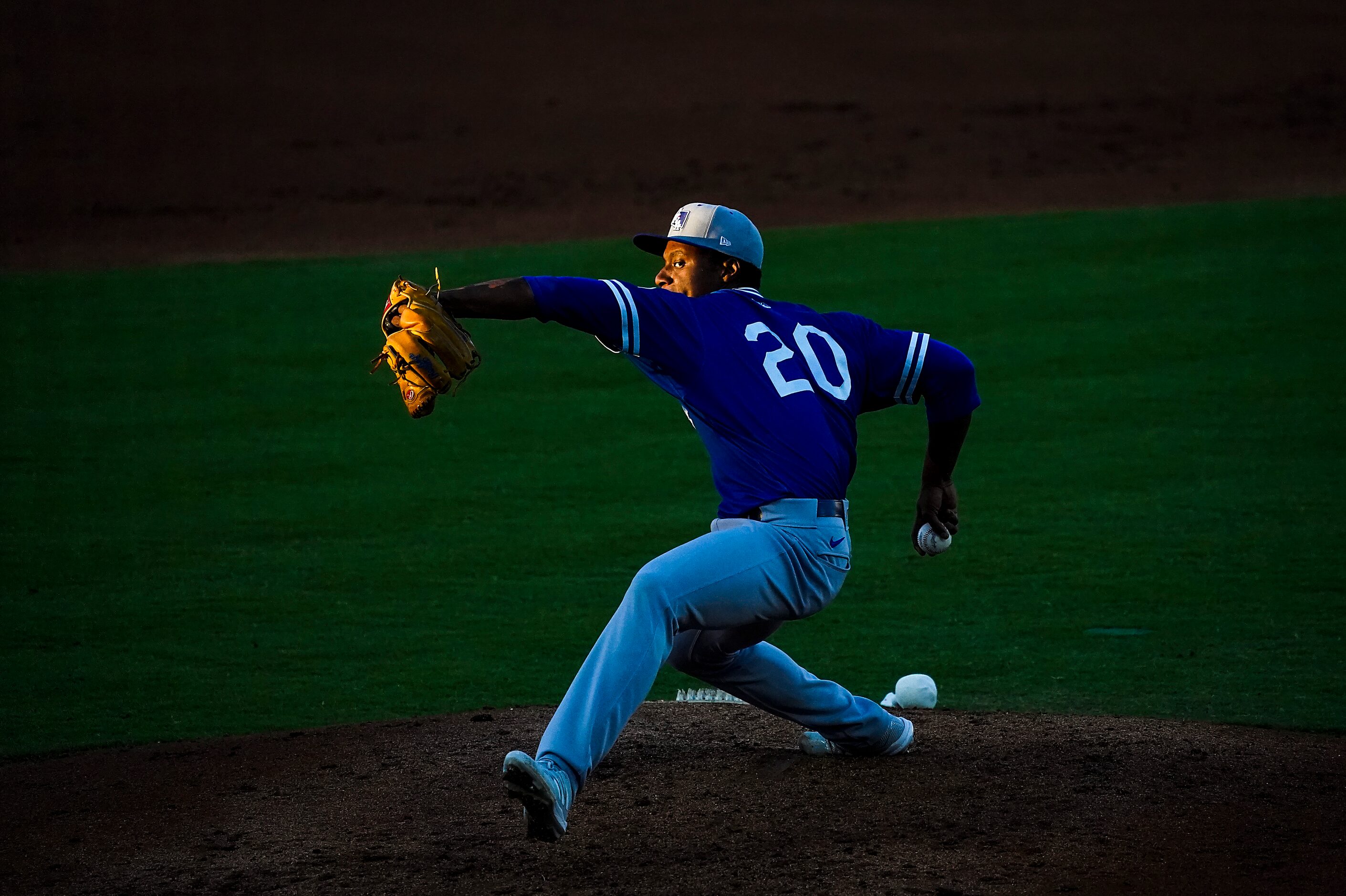 Oklahoma City Dodgers pitcher Josiah Gray pitches during the second inning as the last rays...