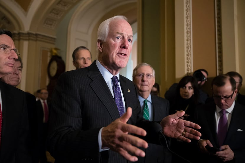 Senate Majority Whip John Cornyn, R-Texas, joined from by, Sen. John Barrasso, R-Wyo., Sen....