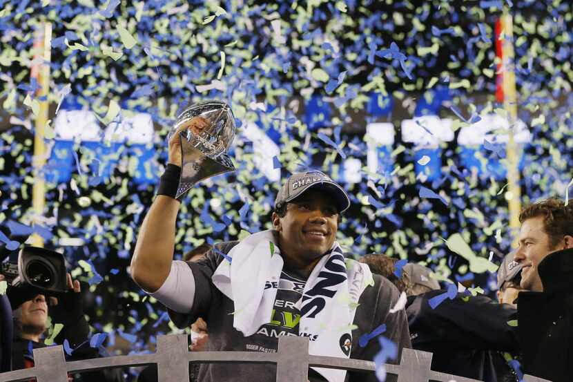 EAST RUTHERFORD, NJ - FEBRUARY 02:  Quarterback Russell Wilson #3 of the Seattle Seahawks...