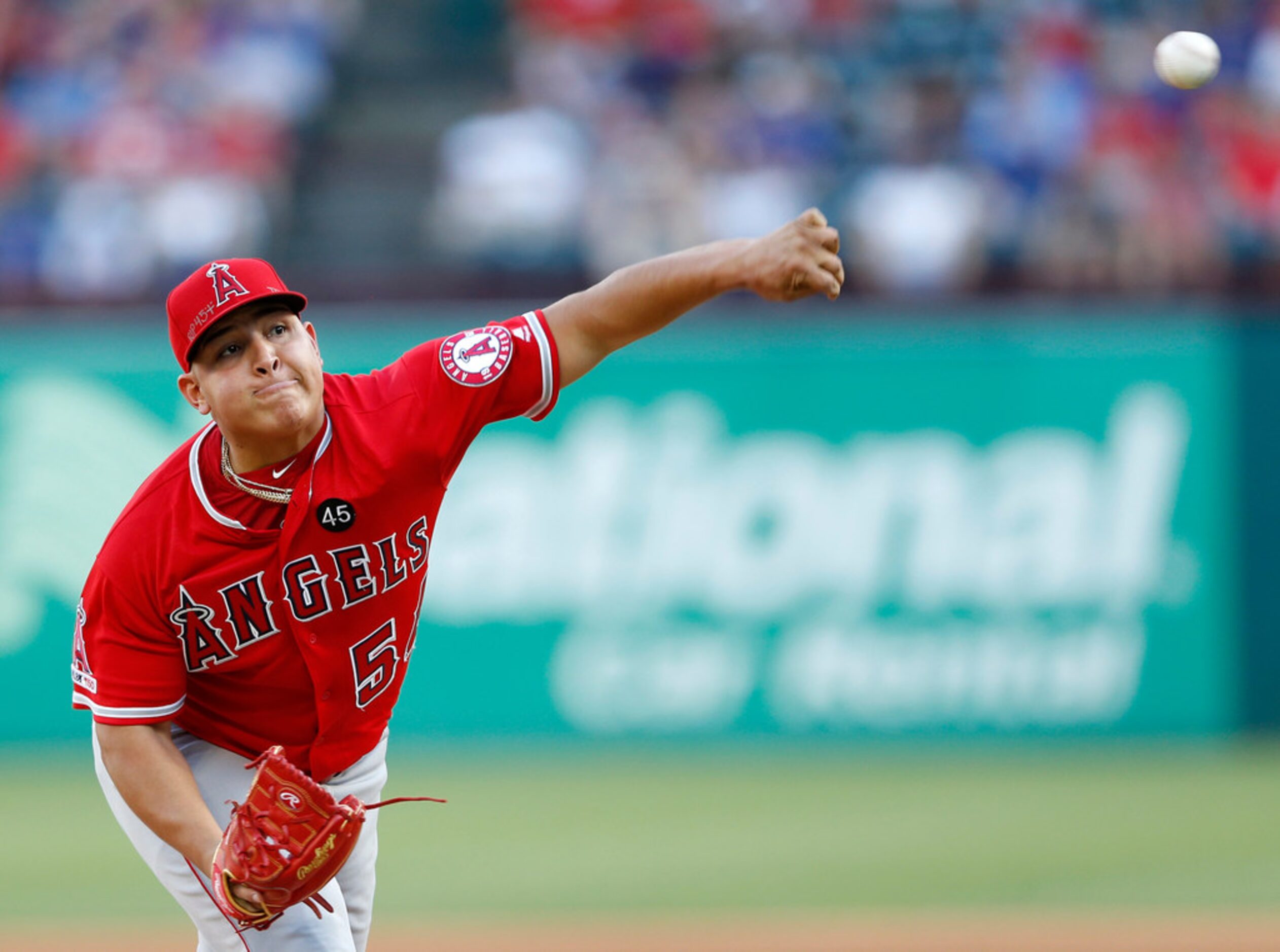 Los Angeles Angels starting pitcher Jose Suarez (54) pitches during the first inning of play...