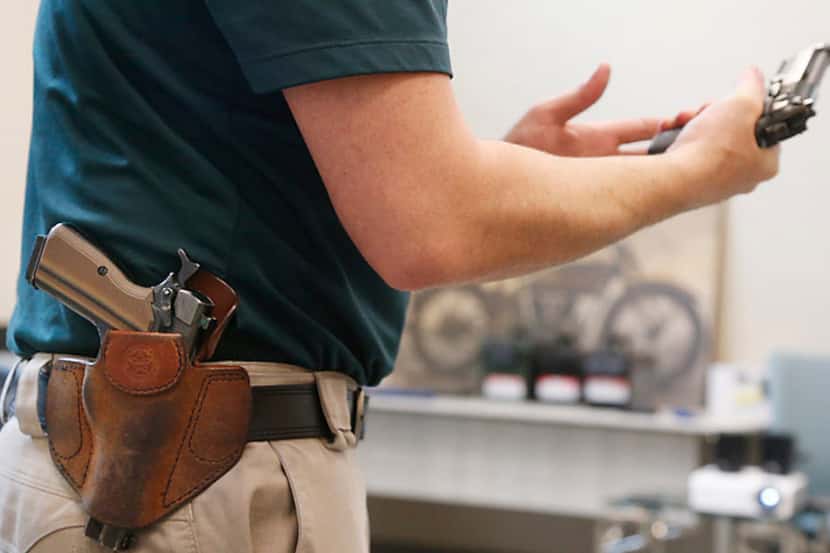  Dallas City Council members on Wednesday discussed the effect of the new open-carry law on...