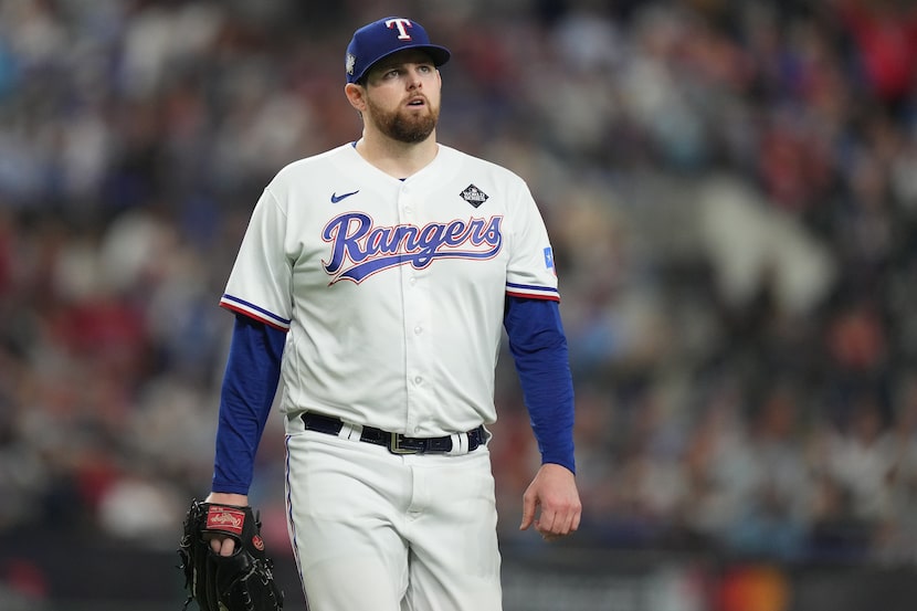 Texas Rangers starting pitcher Jordan Montgomery walks to the dugout after inducing a pop-up...