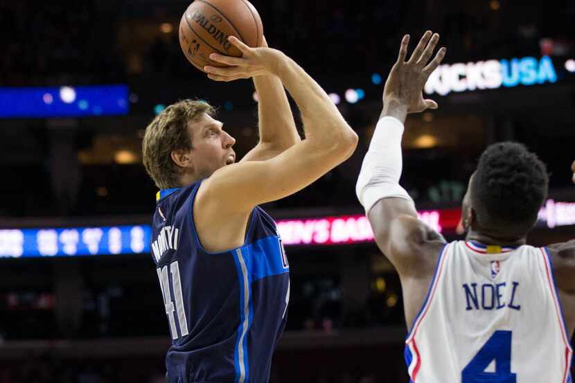 Nov 16, 2015; Philadelphia, PA, USA; Dallas Mavericks forward Dirk Nowitzki (41) shoots past...
