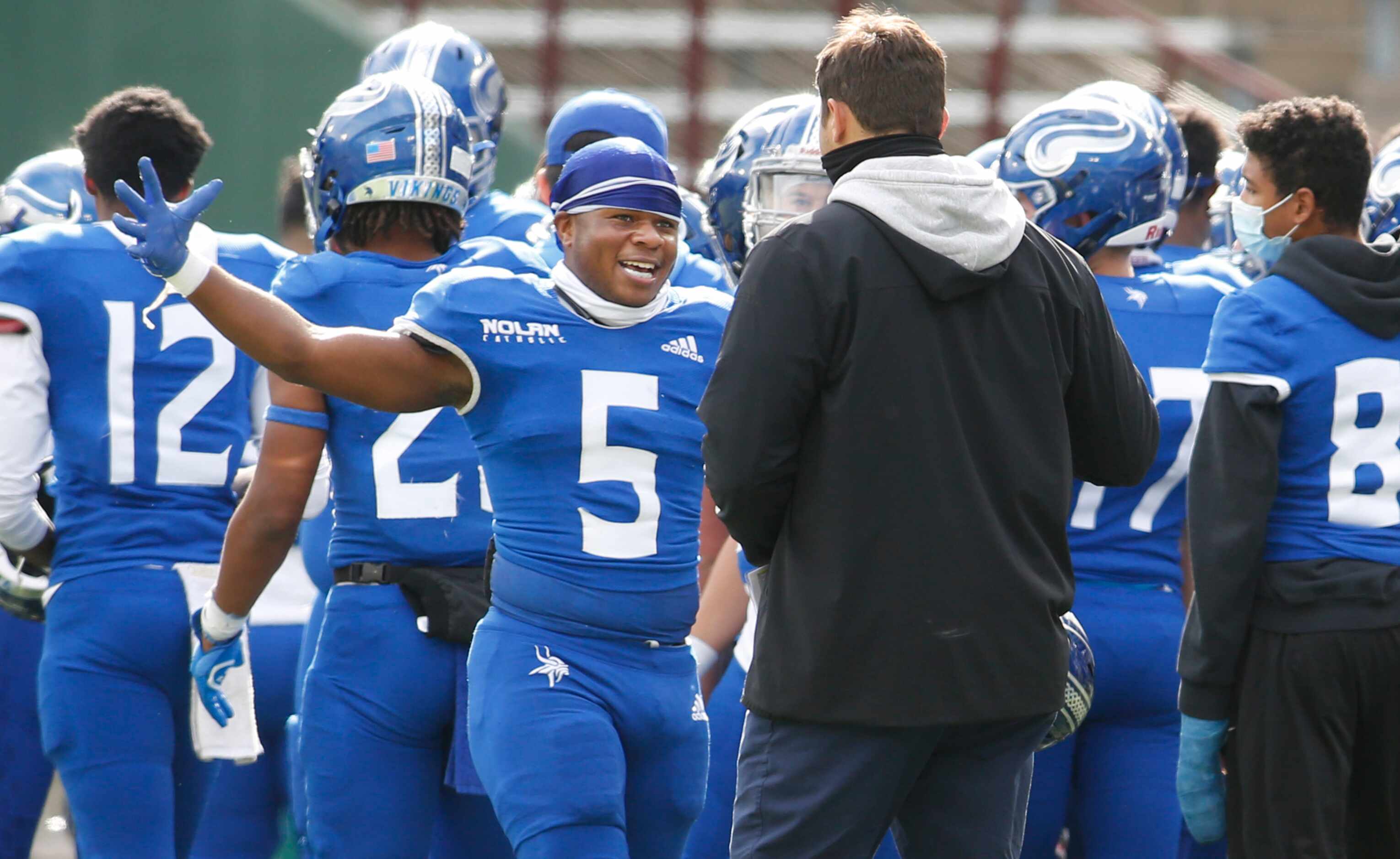 Fort Worth Nolan running back Kennon Polk (5) was all smiles as the final seconds roll off...