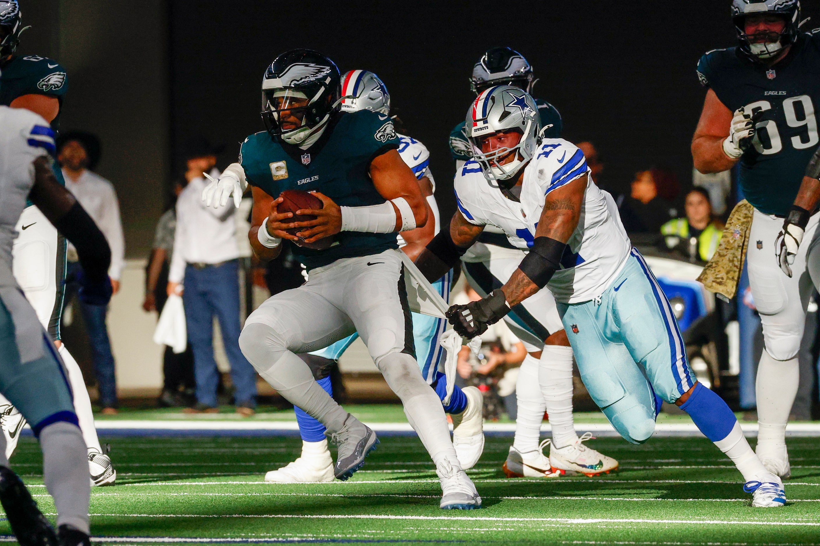 Dallas Cowboys linebacker Micah Parsons (11) pursues Philadelphia Eagles quarterback Jalen...