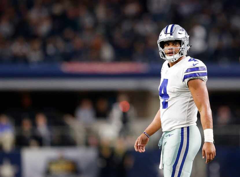 Dallas Cowboys quarterback Dak Prescott (4) after throwing an interception in a game against...