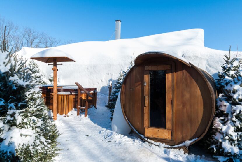 Overnight guests at Hôtel de Glace have all-night access to a sauna and four outdoor hot...
