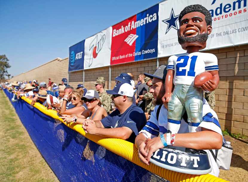 Dallas Cowboys fan Alex Hurtado has a giant bobblehead of running back Ezekiel Elliott...