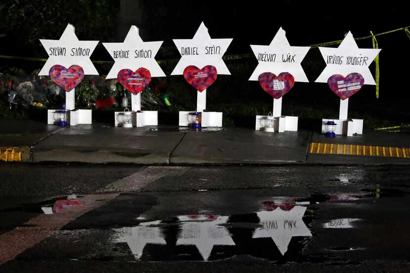 Stars of David with names of those killed at the Tree of Life Synagogue in Pittsburgh are...