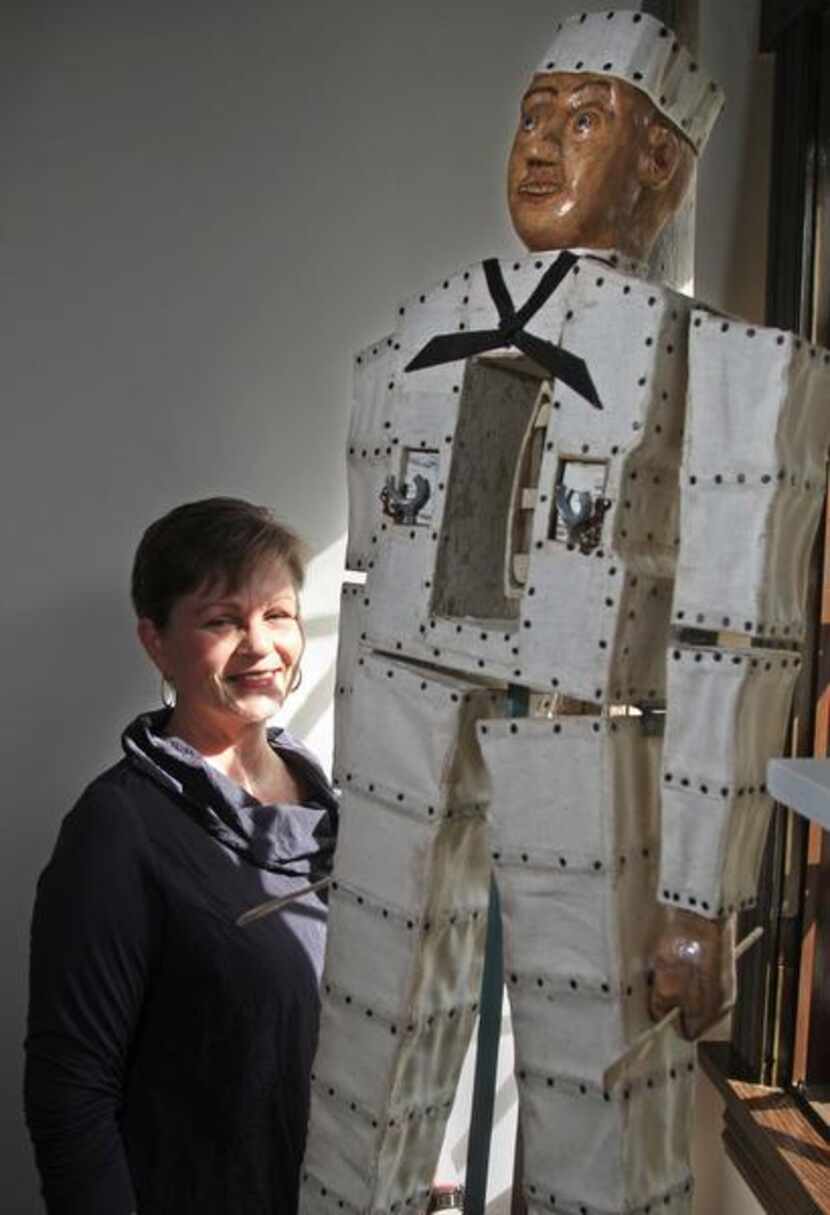 
Antique dealer and collector Ann Williams is drawn to funky folk art such as the canvas and...