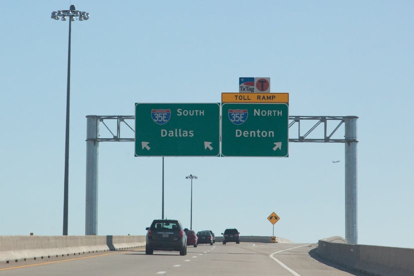 Vehicles travel on the exit ramp from Sam Rayburn Tollway on Wednesday in Lewisville and...