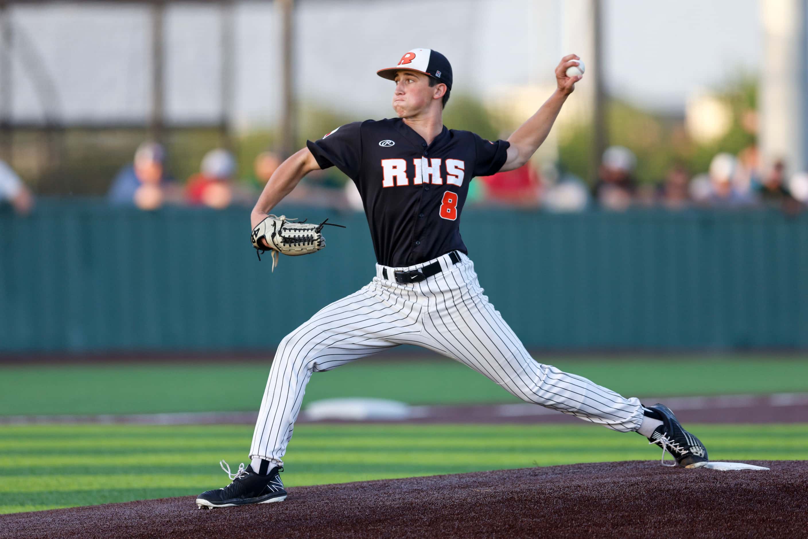 Rockwall starting pitcher Cade Crossland (8) delivers a pitch against Waxahachie during a...