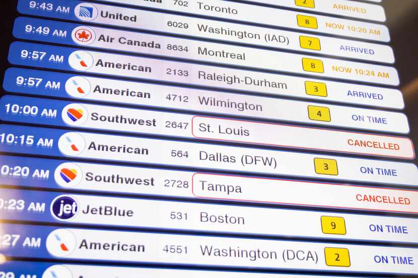 Canceled Southwest Airlines flights are seen on the flight schedules at LaGuardia Airport in...