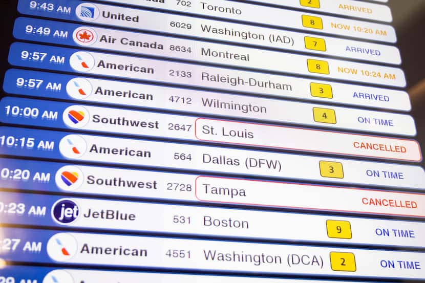 Canceled Southwest Airlines flights are seen on the flight schedules at LaGuardia Airport in...