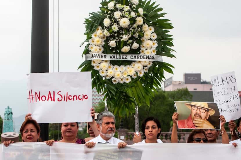 Journalists from the state of Nuevo Leon and members of civil organizations protest against...
