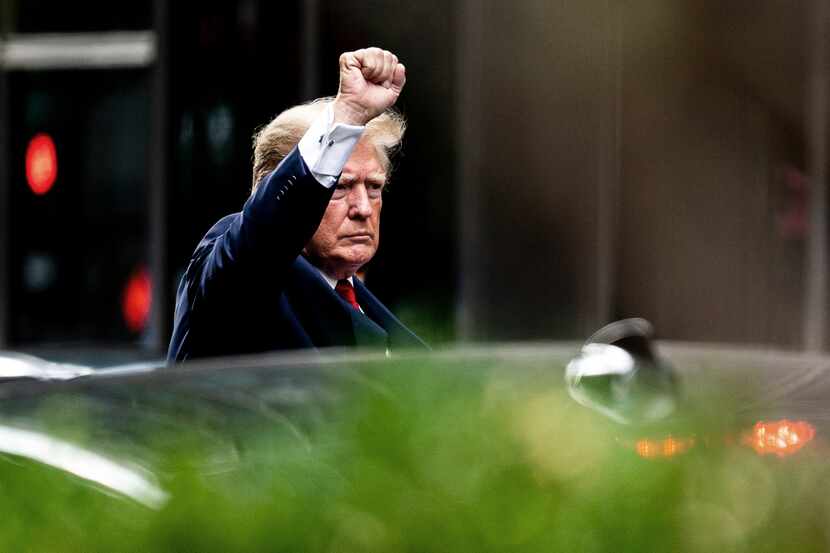 Former President Donald Trump gestures as he departs Trump Tower on Aug. 10, 2022, in New...