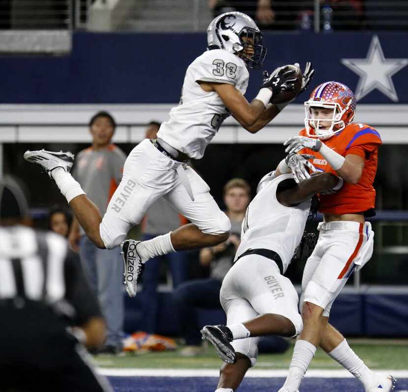 Denton Guyer High School cornerback Dio Williams (38) makes a key interception in the end...