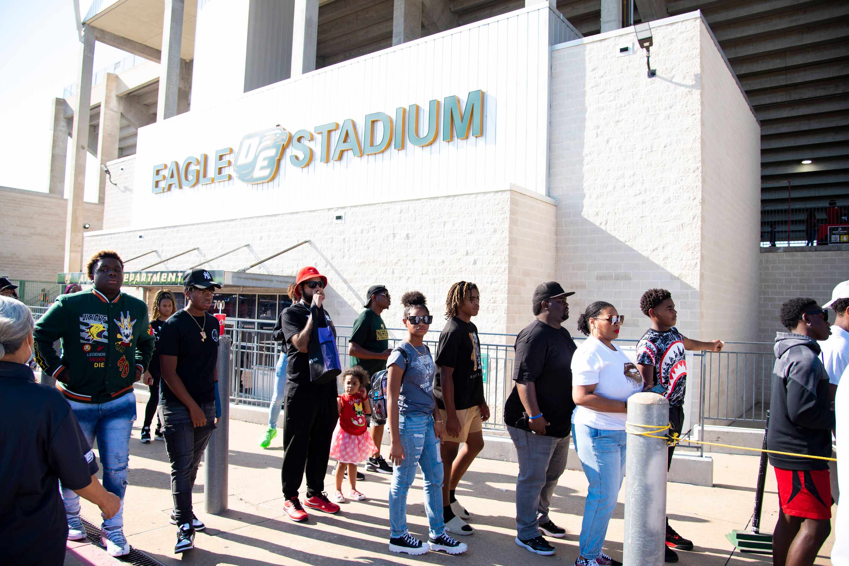 Fans wait in line to enter Eagle Stadium prior to the start of DeSoto’s home game against...