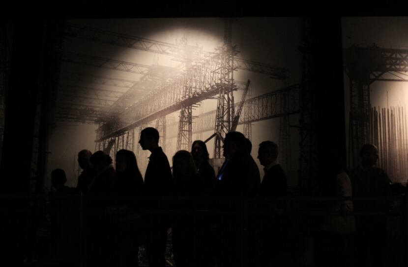 People queue inside the Titanic Belfast visitor centre in Belfast, Northern Ireland. The...