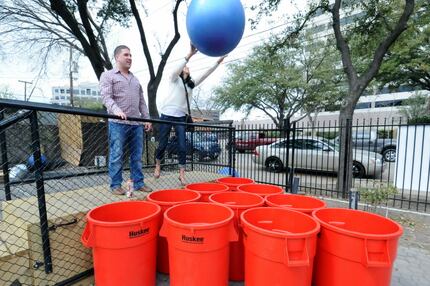 Tim Lawson and Stefanie Accardo play a round of giant beer pong at Social House.