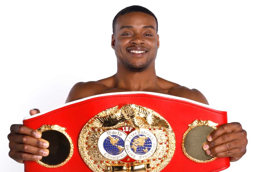 Errol Spence Jr., IBF welterweight champion, poses for a portrait with his belt he won at...