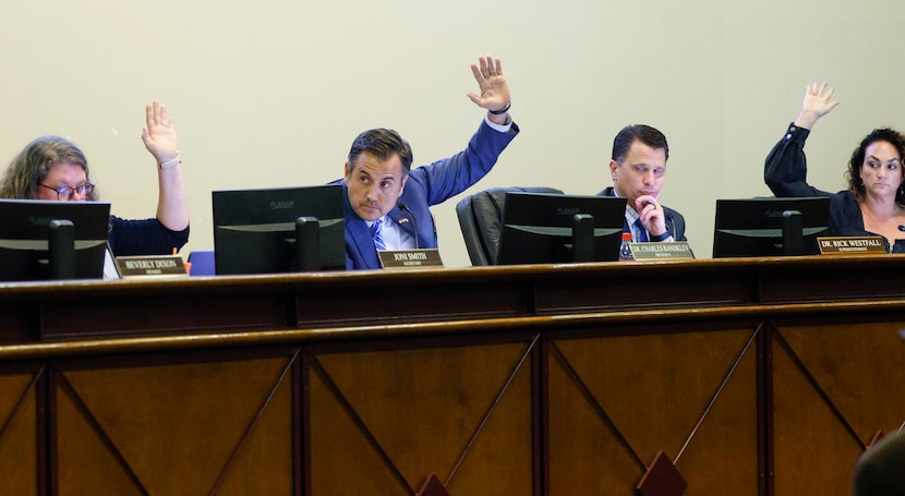 Keller ISD school board members Joni Smith (left), Charles Randklev (second from left) and...