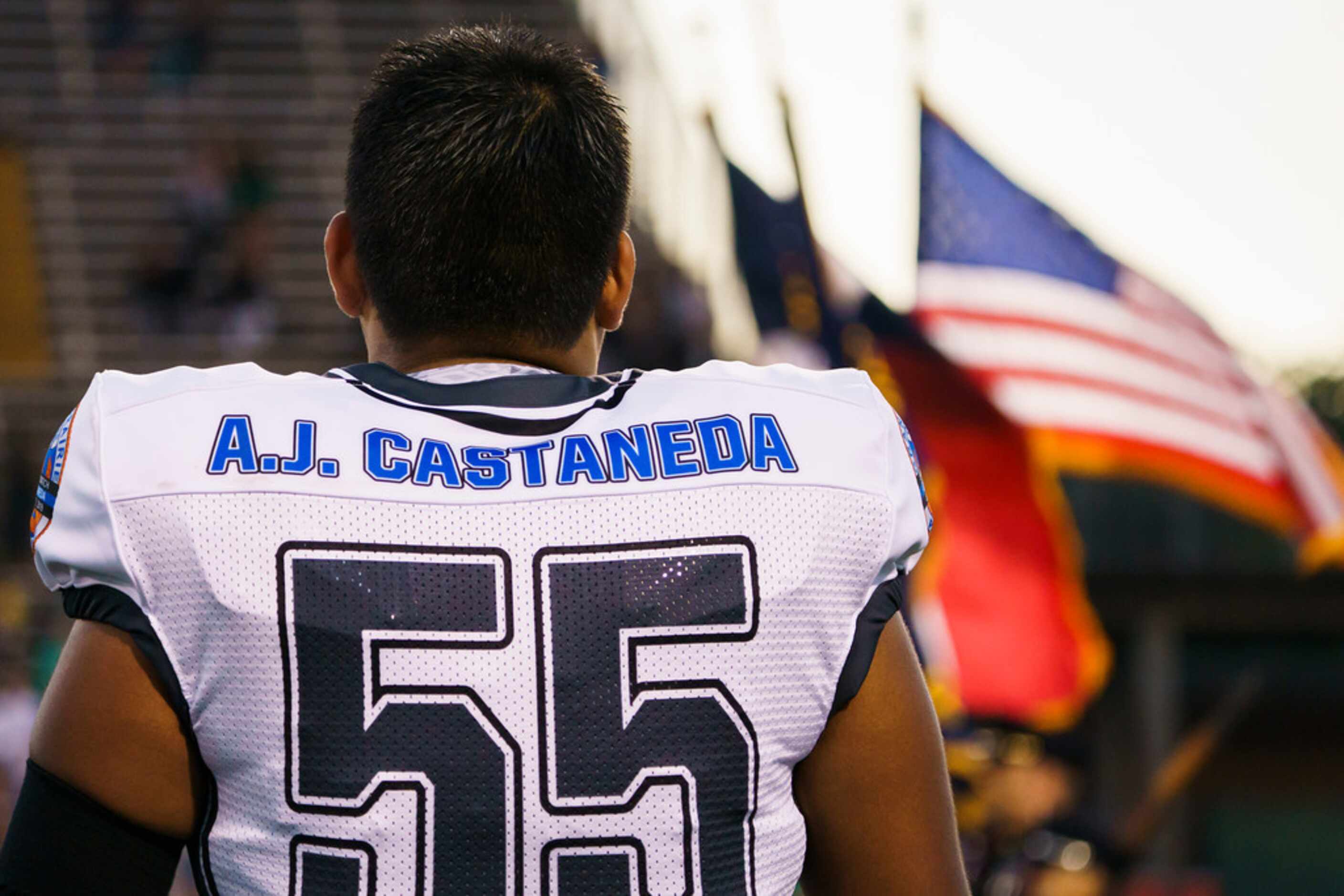 Arlington Martin players wear jerseys honoring Grand Prairie police officer A.J. Castaneda,...