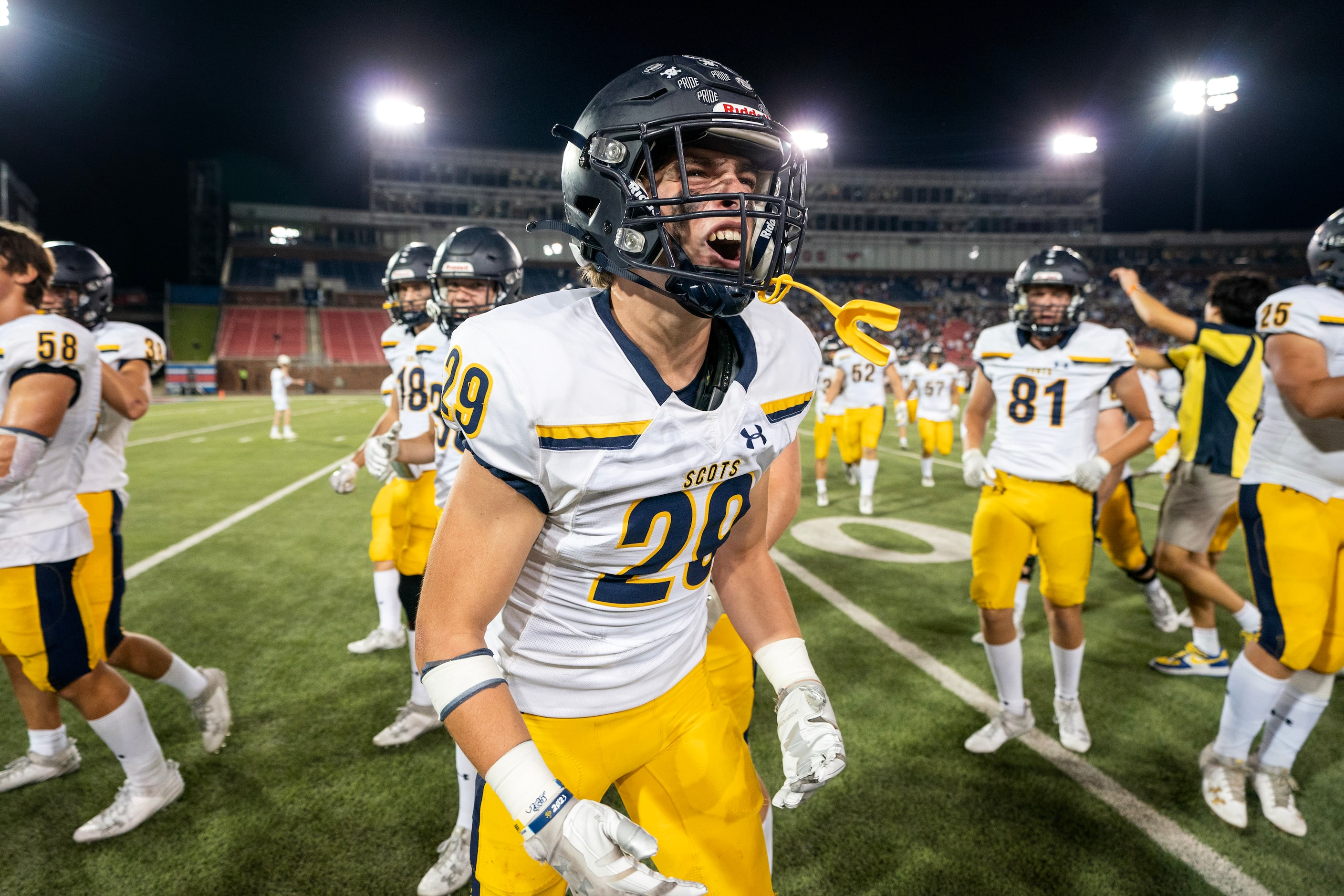 Highland Park senior safety Hatcher Keiser (29) celebrates his team’s 15-13 win over Jesuit...