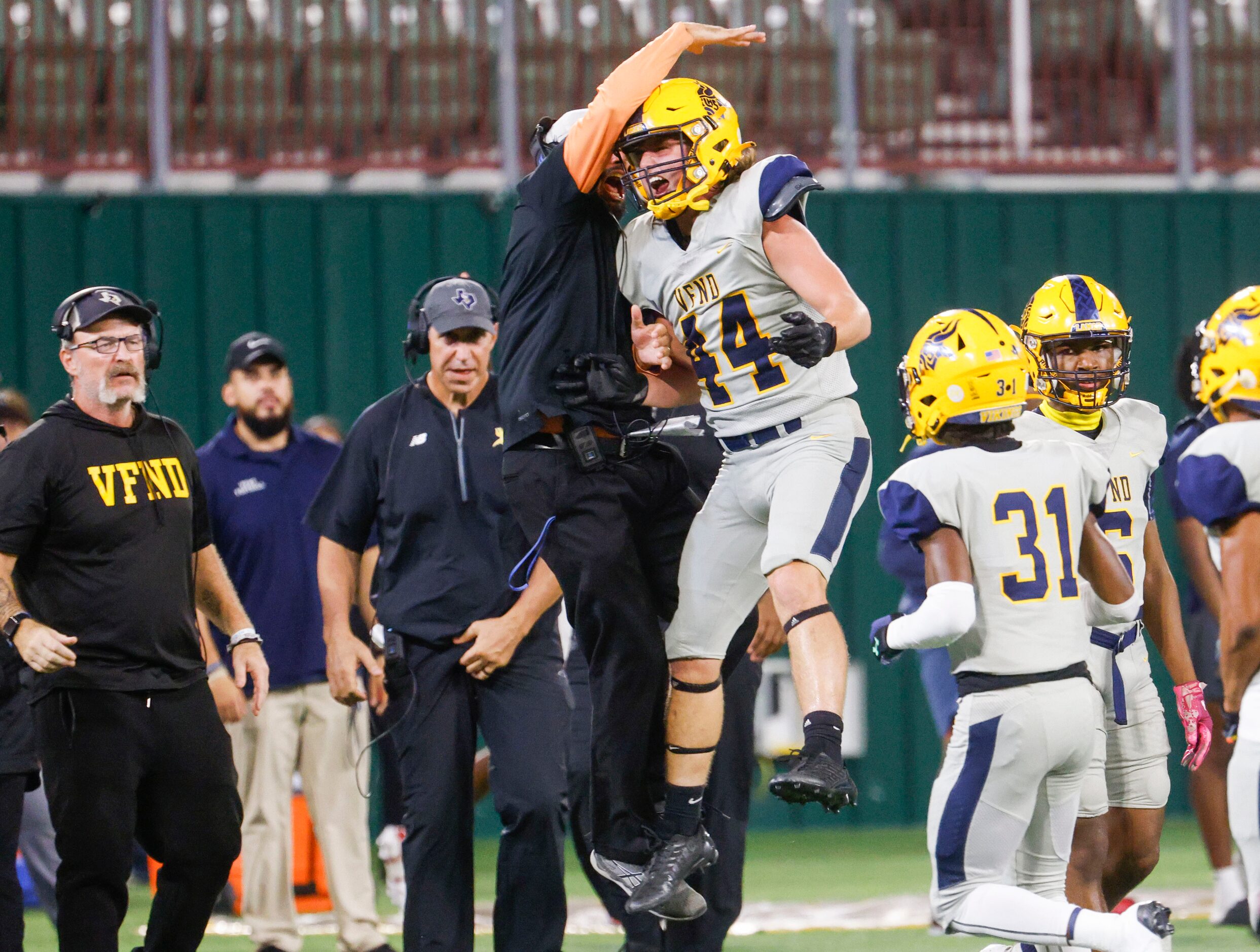 Lamar High’s Ranson Burns (44) celebrates after an interception against James Bowie High...