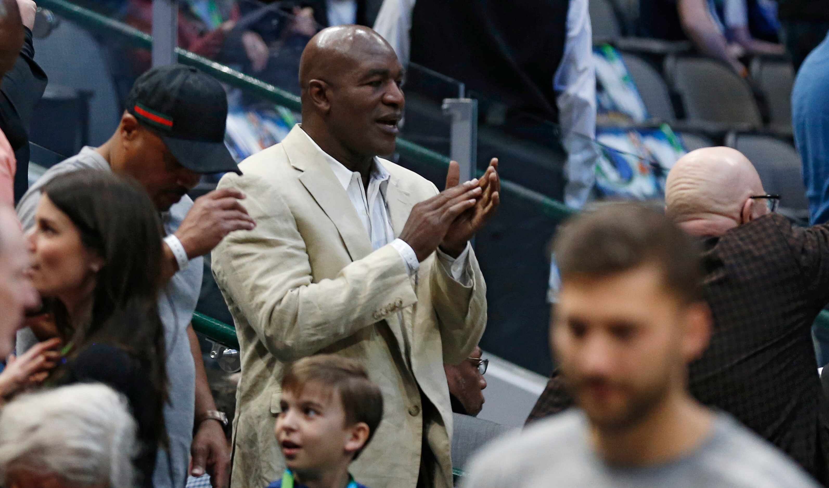 Former boxer Evander Holyfield in attendance in a game between the Dallas Mavericks and...
