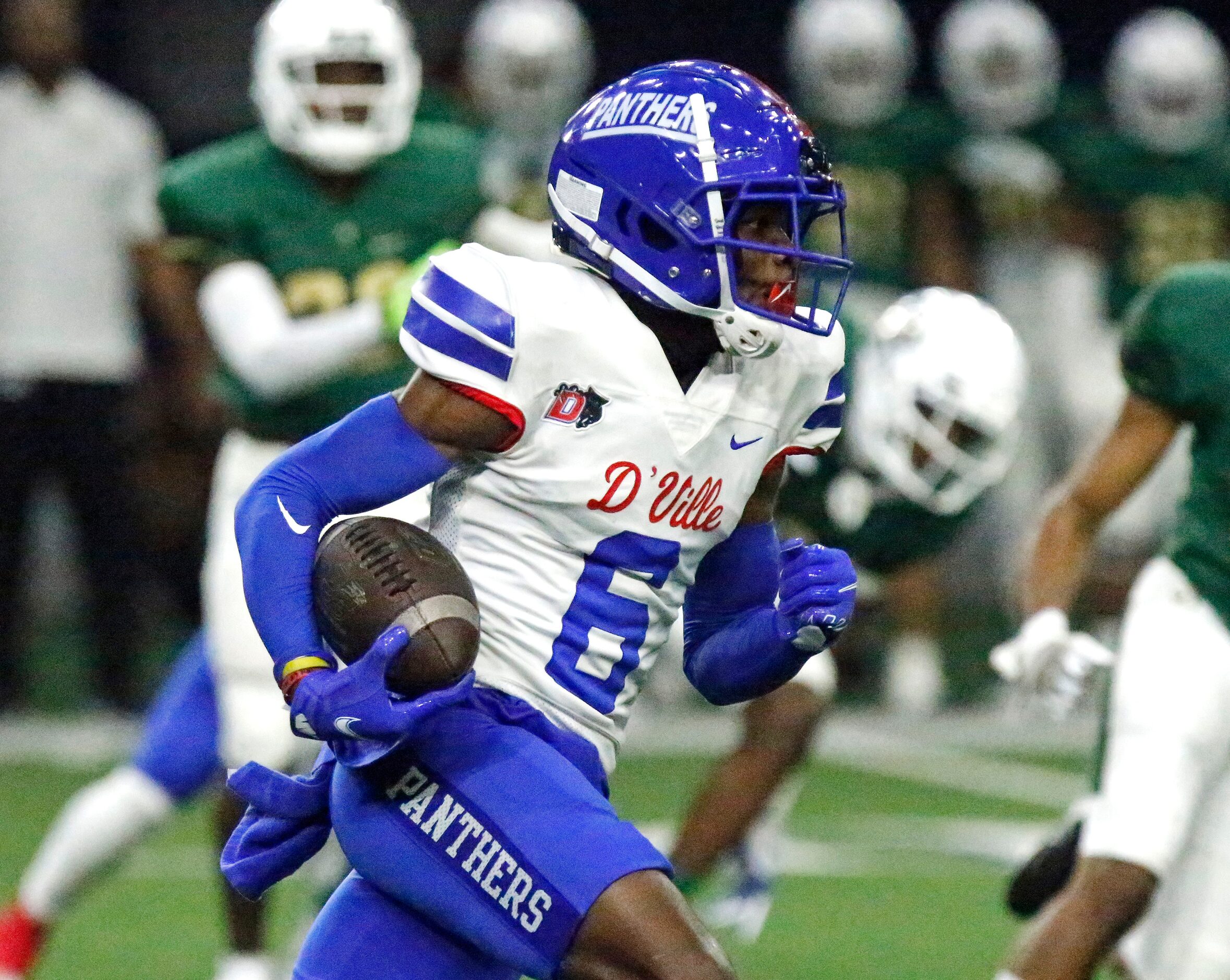 Duncanville High School kick returner Damyrion Coleman (6) gets a big return during the...