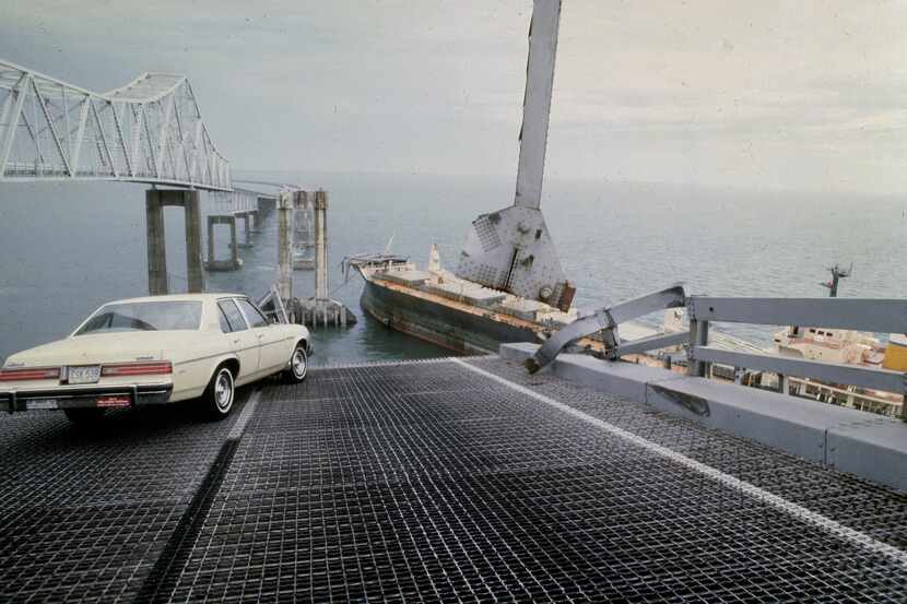 FILE - A car is halted at the edge of the Sunshine Skyway Bridge across Tampa Bay, Fla.,...